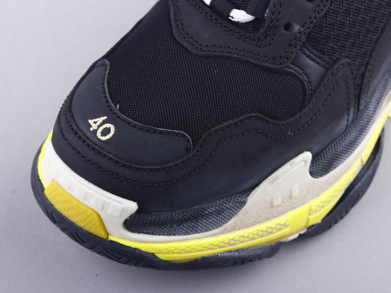 EI -Bla Triple S Black And Yellow Sneaker